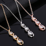 Witgouden ketting met oneindigheidshanger en zirkonia