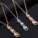 Witgouden ketting met oneindigheidshanger en zirkonia