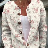 Vest met roze rozenprint en knopen