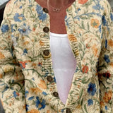 Cornelia | Crème kleurige cardigan met bloemenpatroon