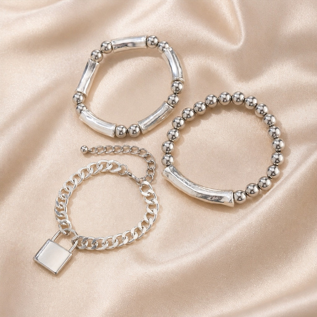 Set witgouden armbanden met parels en punksluiting