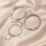Set witgouden armbanden met parels en punksluiting
