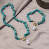 Set van ketting en armband met turkoois en parels
