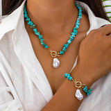Set van ketting en armband met turkoois en parels