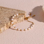 Elegante armband van parelmoer en goud