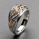 Goud- en zilverkleurige ring met sculpturaal ontwerp