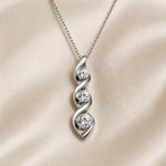 Witgouden ketting met oneindigheidshanger en zirkonia