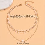 Driedubbele ketting met lagen parels
