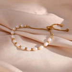 Elegante armband van parelmoer en goud