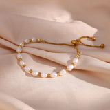 Elegante armband van parelmoer en goud
