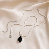 Glinsterende ovale witgouden ketting