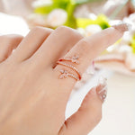 Witgoudkleurige ring met vlinders en ingezette zirkonia