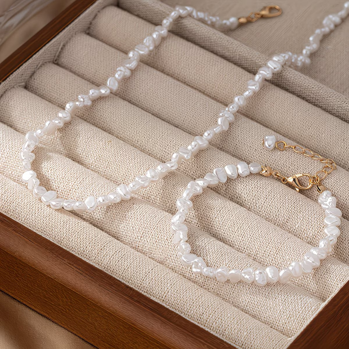 Set van ketting en armband met barokparels