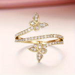 Witgoudkleurige ring met vlinders en ingezette zirkonia