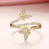 Witgoudkleurige ring met vlinders en ingezette zirkonia