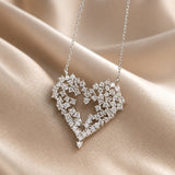 Witgouden hangerketting met hart van zirkoon