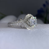 Witgoudkleurige ring met moissaniet en gespleten ringband