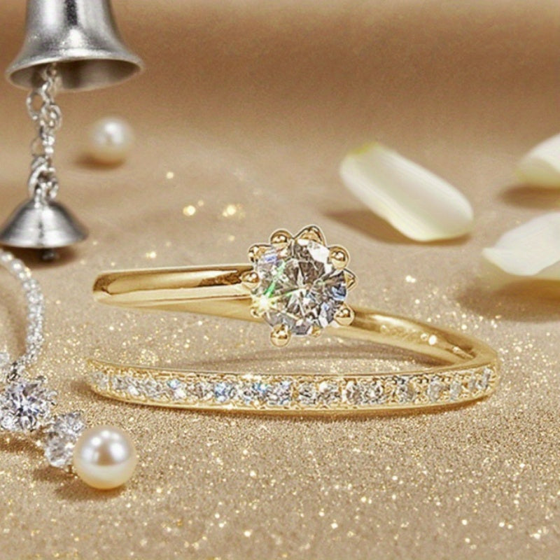 Glinsterende ring met zirkonia en witgouden plating