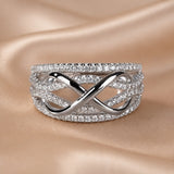Oneindigheidsring met zirkonia en witgouden plating