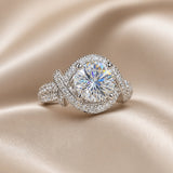 Witgoudkleurige ring met moissaniet en gespleten ringband