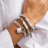 Set witgouden armbanden met parels en punksluiting