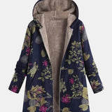 Aurora – Marineblauwe jas met bloemenpatroon