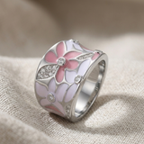 Witgouden ring met roze bloem