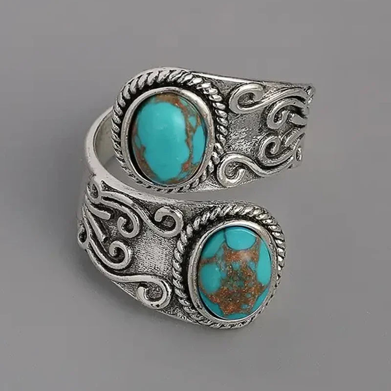 Calista™ – Open zilveren ring met twee turkooizen stenen