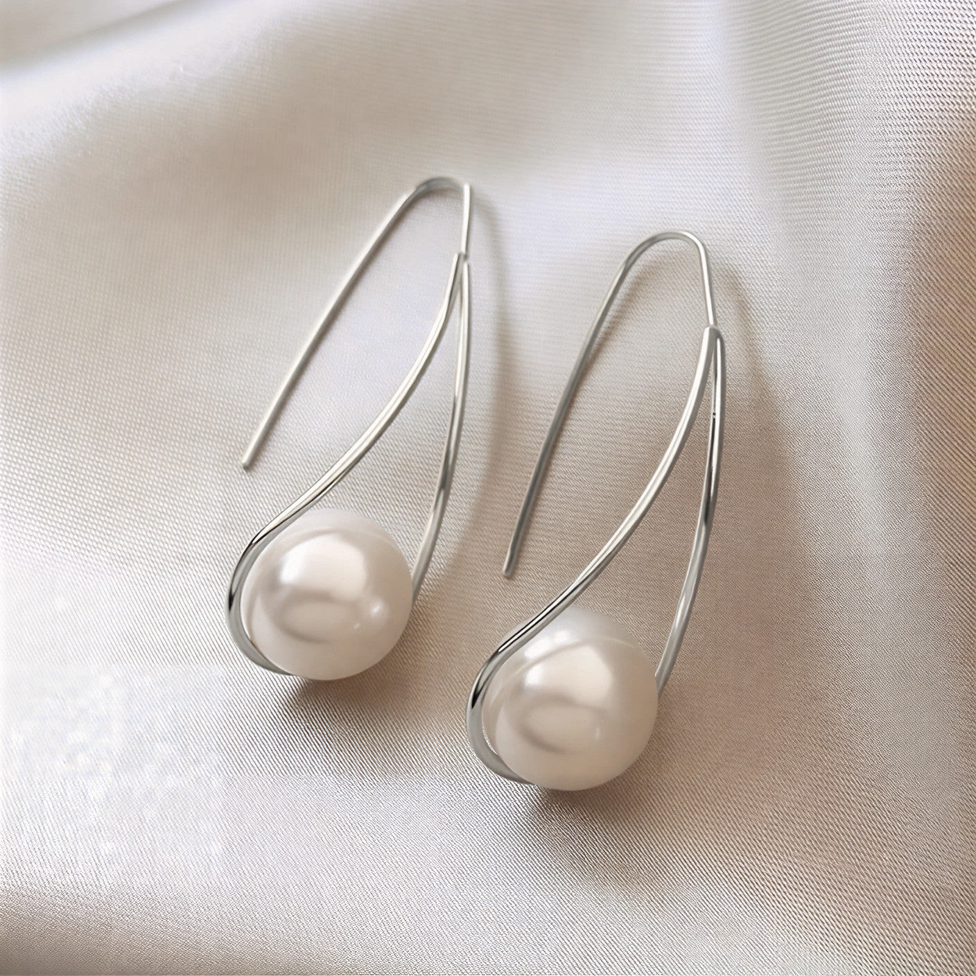 Elegante oorbellen met mysterieuze parel