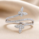 Witgoudkleurige ring met vlinders en ingezette zirkonia
