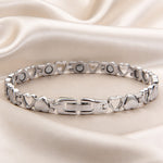 Verfijnde witgoudkleurige armband met harthanger