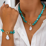 Set van ketting en armband met turkoois en parels