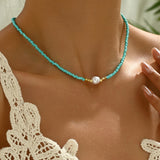 Minimalistische ketting met turkoois en kralen