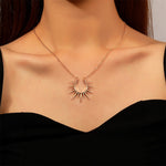 Witgouden ketting met zonnebloemhanger
