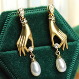 Elegante oorbellen met parels