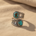 Calista™ – Open zilveren ring met twee turkooizen stenen