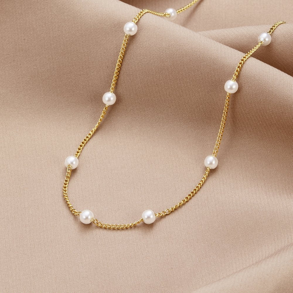 Tijdloze gouden ketting met parelmoer