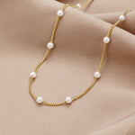 Tijdloze gouden ketting met parelmoer