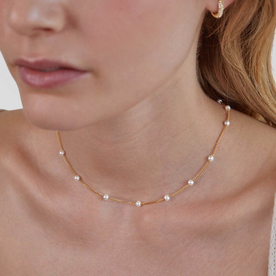 Tijdloze gouden ketting met parelmoer